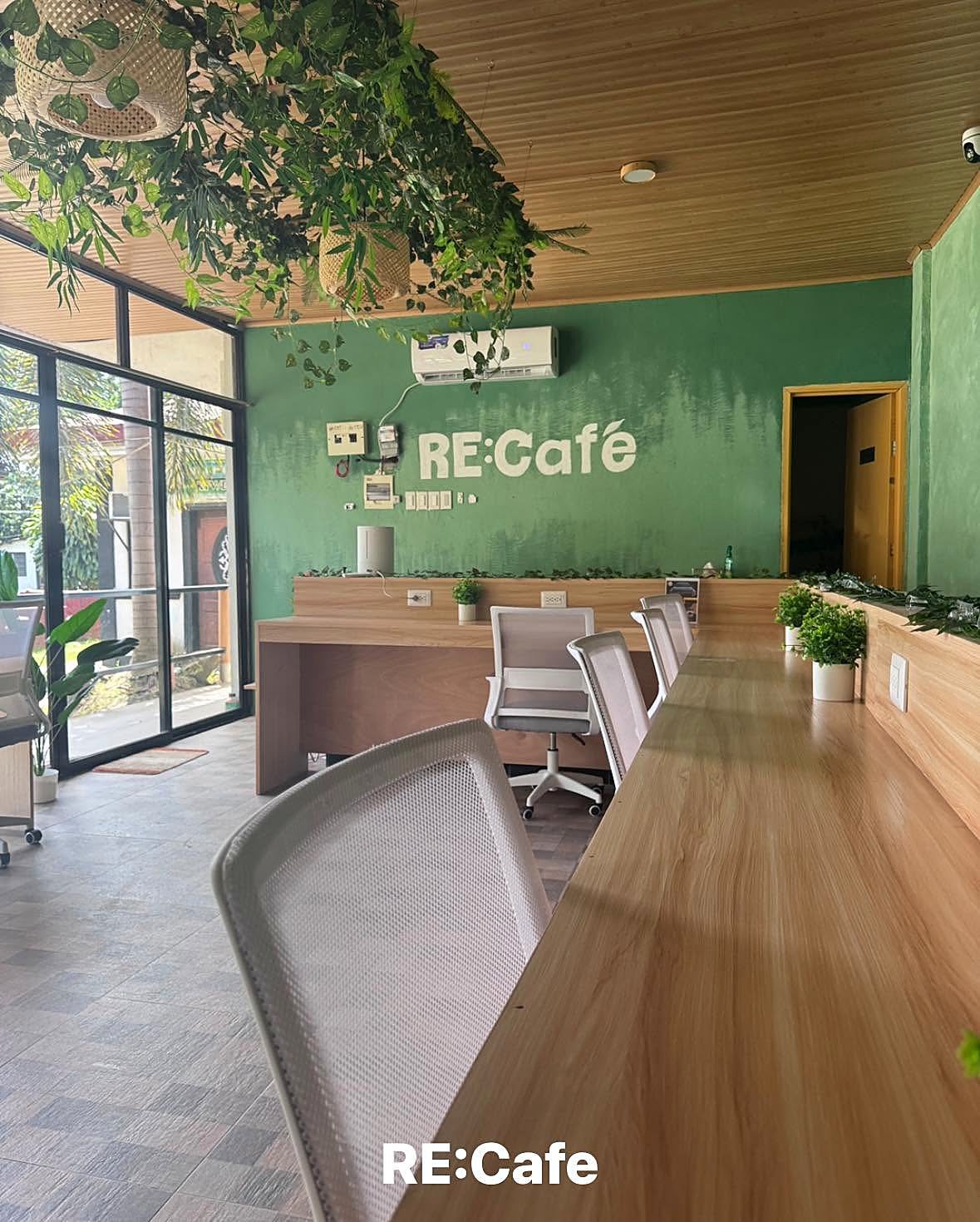 Comfortable coworking desks and chairs at RE: Café